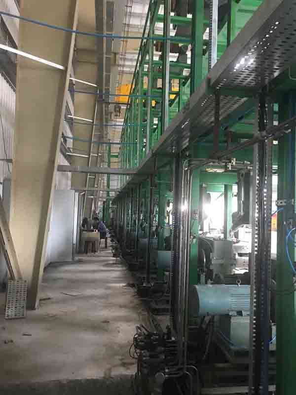 Steel strapping tempering and painting line with oscillating